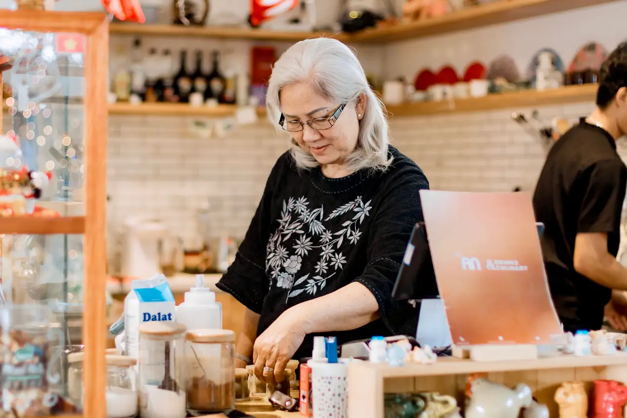 A cafe owner at work