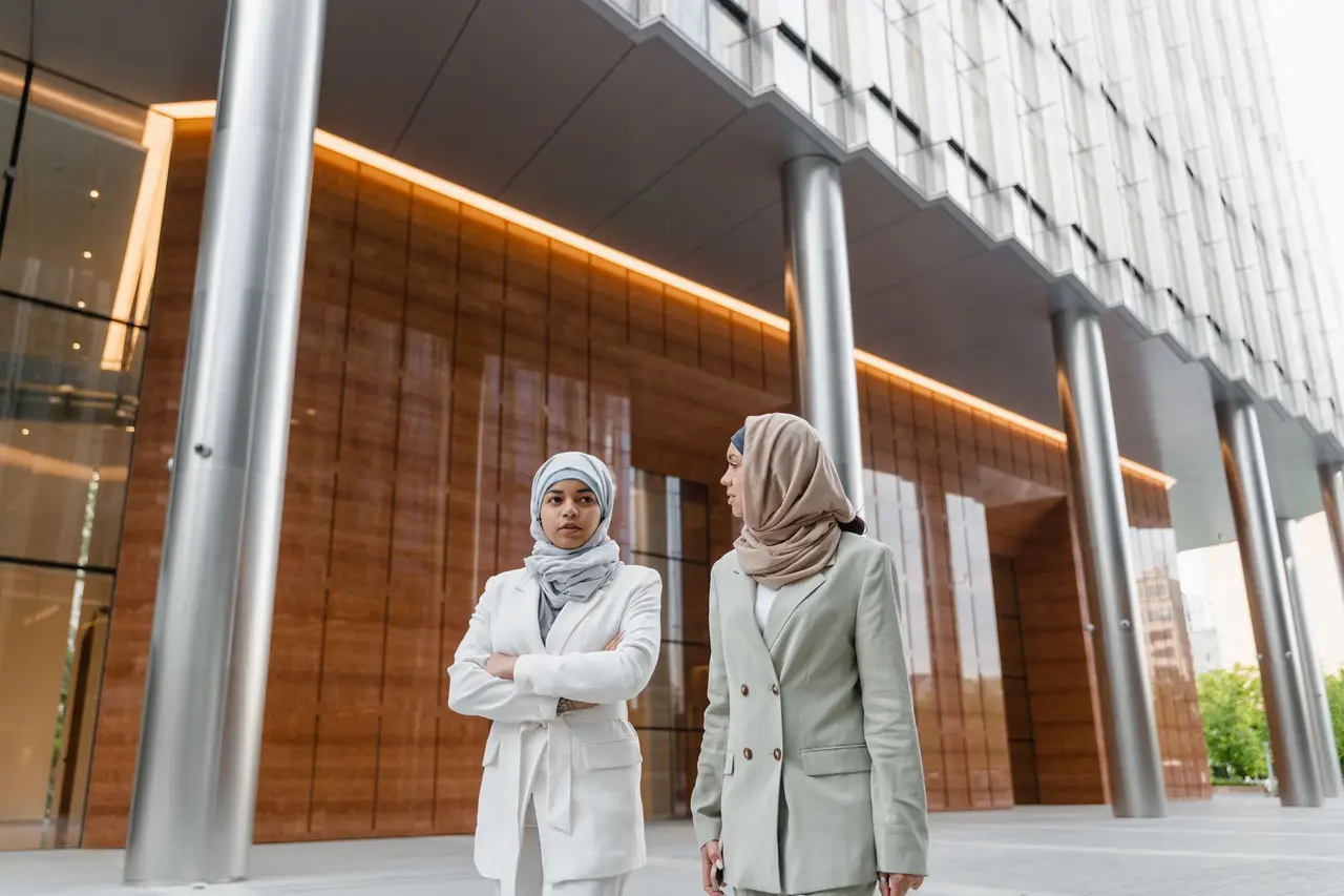 Two support workers walking together
